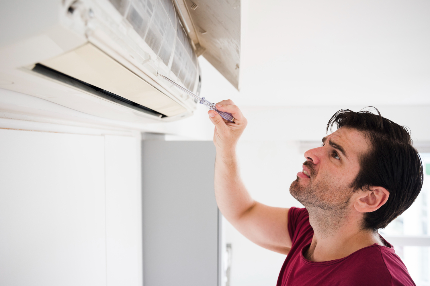 A technician performing AC Replacement in Sammamish, WA